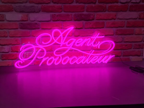 Agent Provocateur' pink LED sign. NeonPlus LED fitted onto cut to shape clear panel.