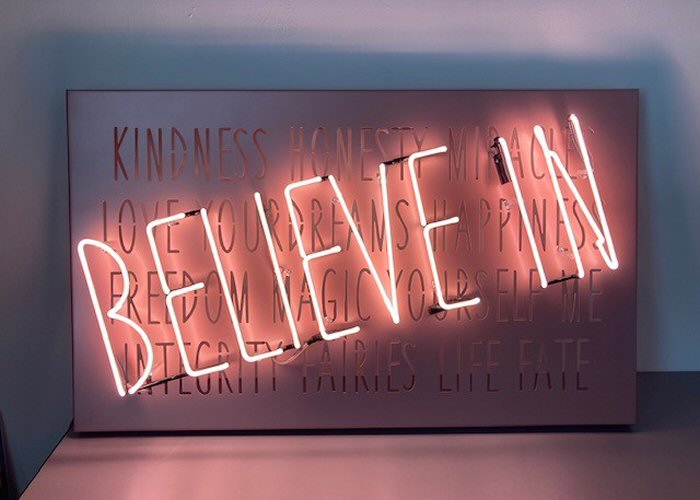 BELIEVE IN' pink neon light. Real glass neon fitted onto fret cut, powder coated metal tray.