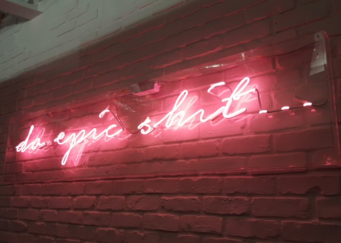 do epic shit…' pink neon sign. Real glass neon fitted inside clear acrylic case.