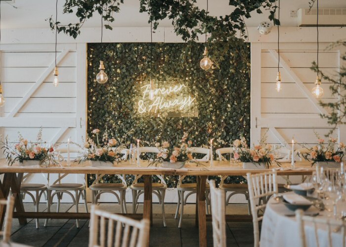 Forever & Always' white neon sign. Real glass neon mounted on clear acrylic panel.