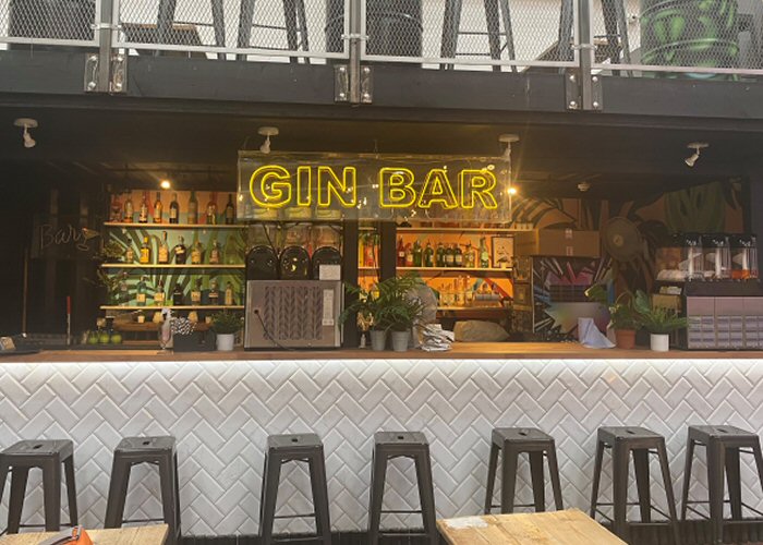 GIN BAR' yellow neon sign. Real glass neon fitted inside clear acrylic case.