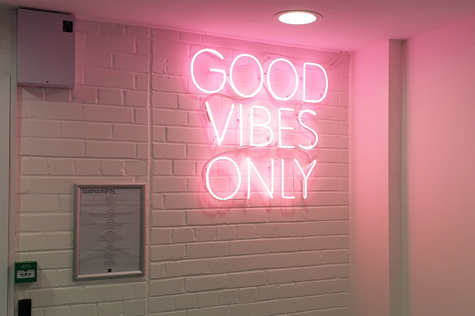 good vibes only' pink neon sign. Real glass neon fitted onto a black acrylic panel.