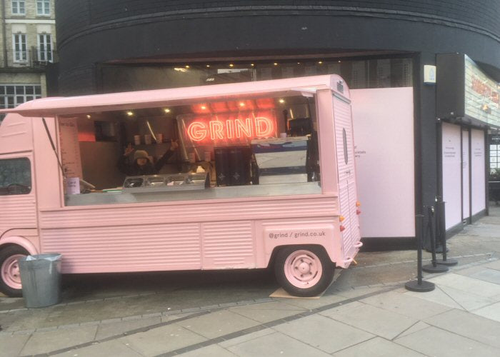 GRIND' pink neon sign. Real glass neon fitted inside clear acrylic case.
