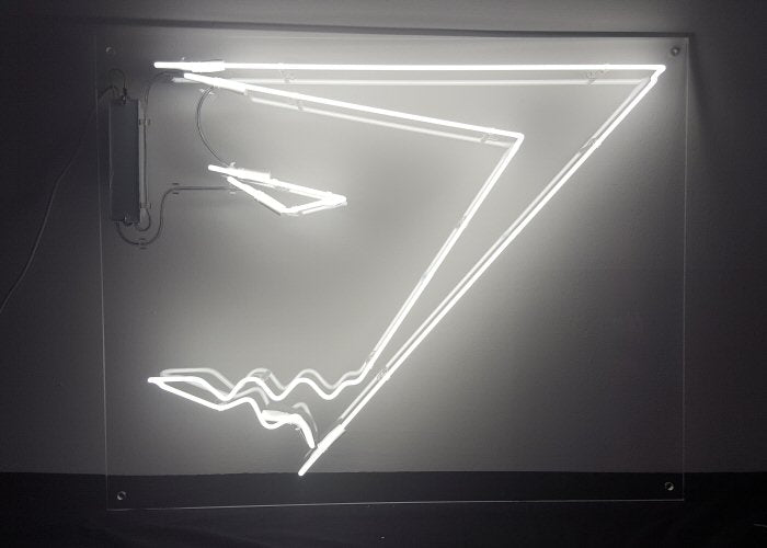 Gymshark' white neon sign. Real glass neon fitted inside clear acrylic case.