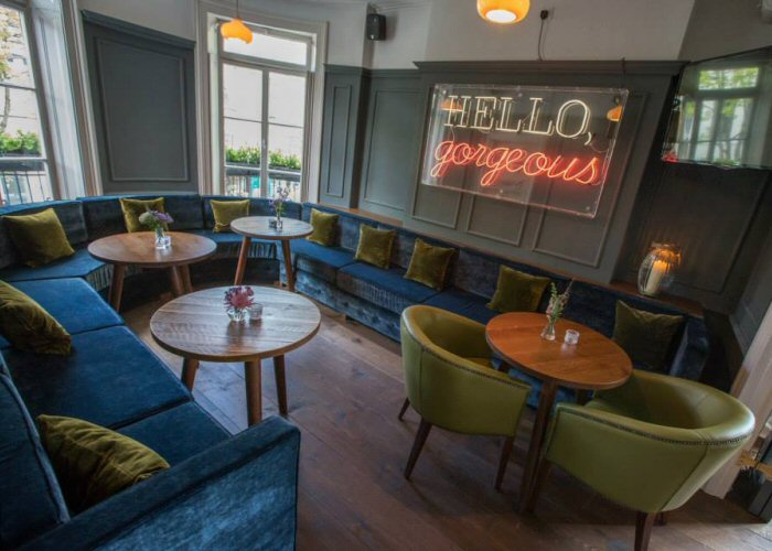 HELLO, gorgeous' white and pink neon sign. Real glass neon fitted inside clear acrylic case.