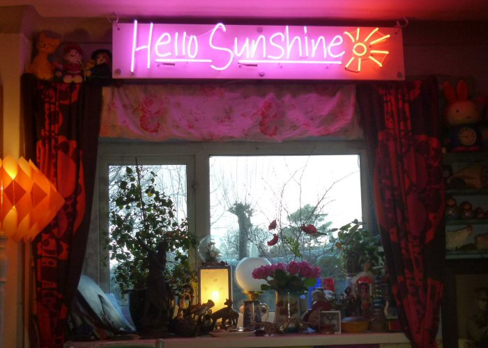 Hello Sunshine' magenta and amber neon sign. Real glass neon on a satin white acrylic panel.