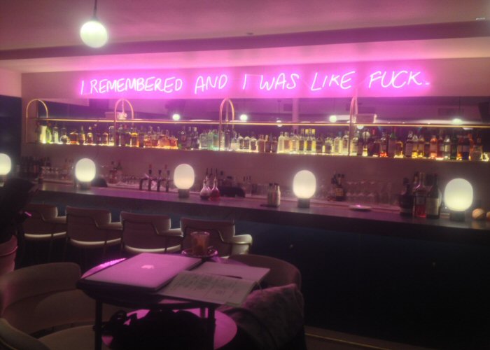 I REMEMBERED AND I WAS LIKE FUCK' pink neon sign. Real glass neon fitted directly onto wall.