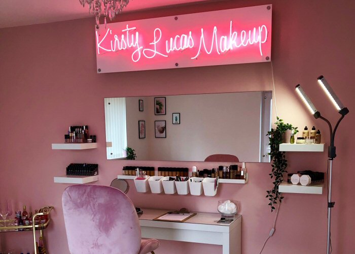 Kirsty Lucas Makeup' pink neon sign. Real glass neon fitted onto white acrylic panel.