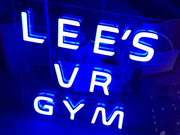 LEE'S VR GYM' blue LED sign. NeonPlus LED fitted onto clear panel.