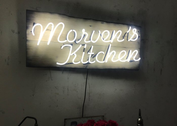 Morven's Kitchen' white neon sign. Real glass neon mounted on to reclaimed wooden panel.