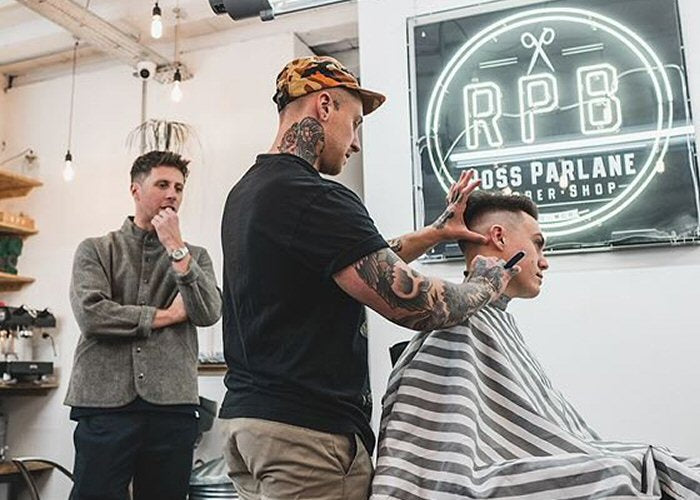 RPB logo' white neon sign. Real glass neon fitted inside acrylic case with black back.