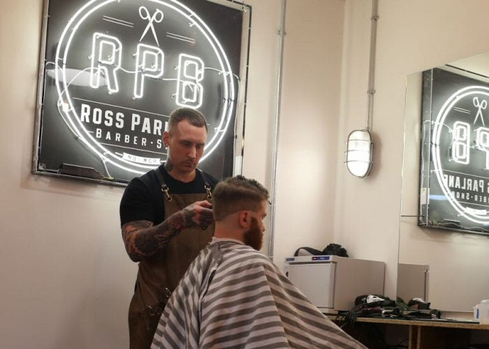 RPB logo' white neon sign. Real glass neon fitted inside acrylic case with black back.