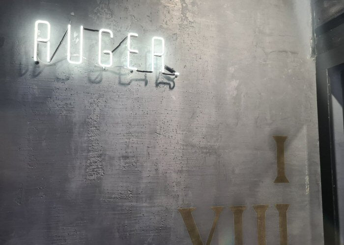 RUGER' white neon sign. Real glass neon fitted directly onto the wall.