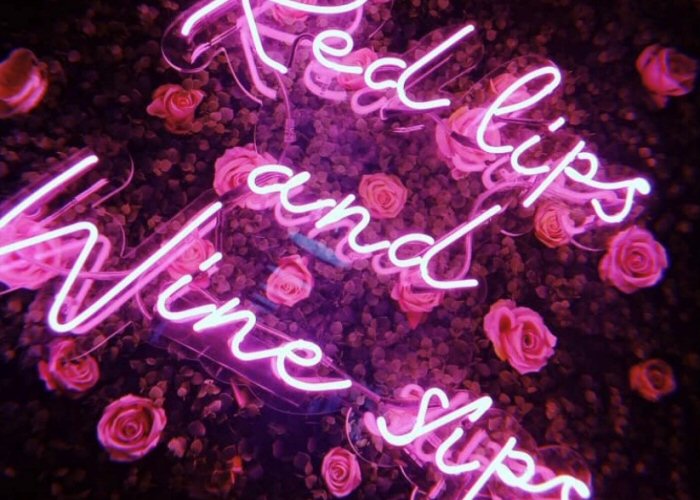 Lips' pink neon infinity box. Real glass neon fitted into an infinity box.