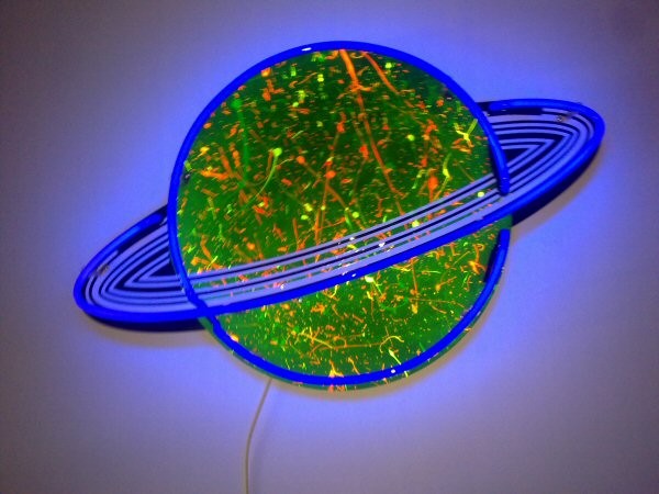 Saturn' UV neon. Real glass neon fitted onto a painted shaped MDF panel.
