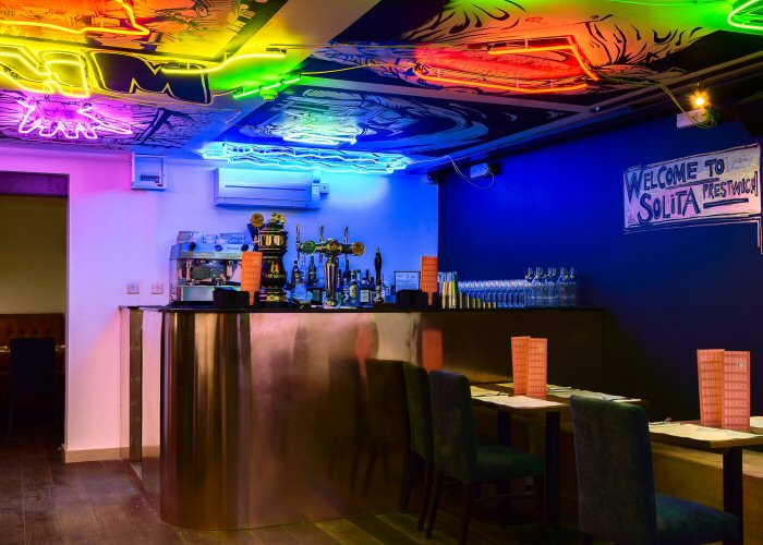 SoLita Chandelier' white neon artwork. Real glass neon fitted directly on to the ceiling.