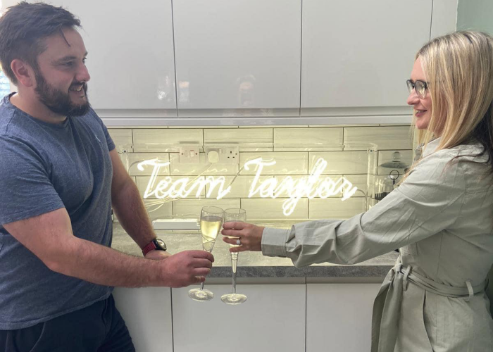 Team Taylor' white neon sign. Real glass neon fitted inside clear acrylic case.