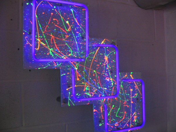 Squares' UV neon. Real glass neon fitted onto cut to shape acrylic panel.