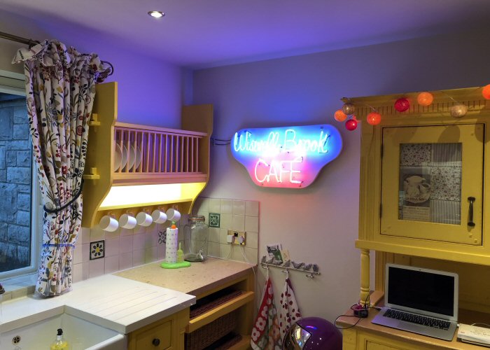 Wiswell Brook Café' blue and red neon sign. Real glass neon fitted onto painted MDF cut to shape panel.