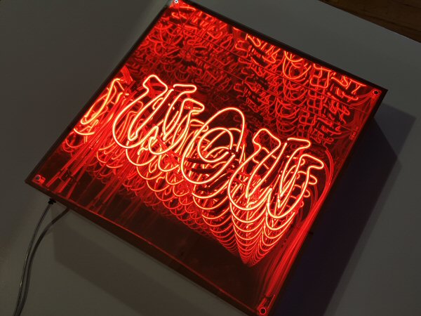 WOW' red neon infinity box. Real glass neon fitted into an infinity box.