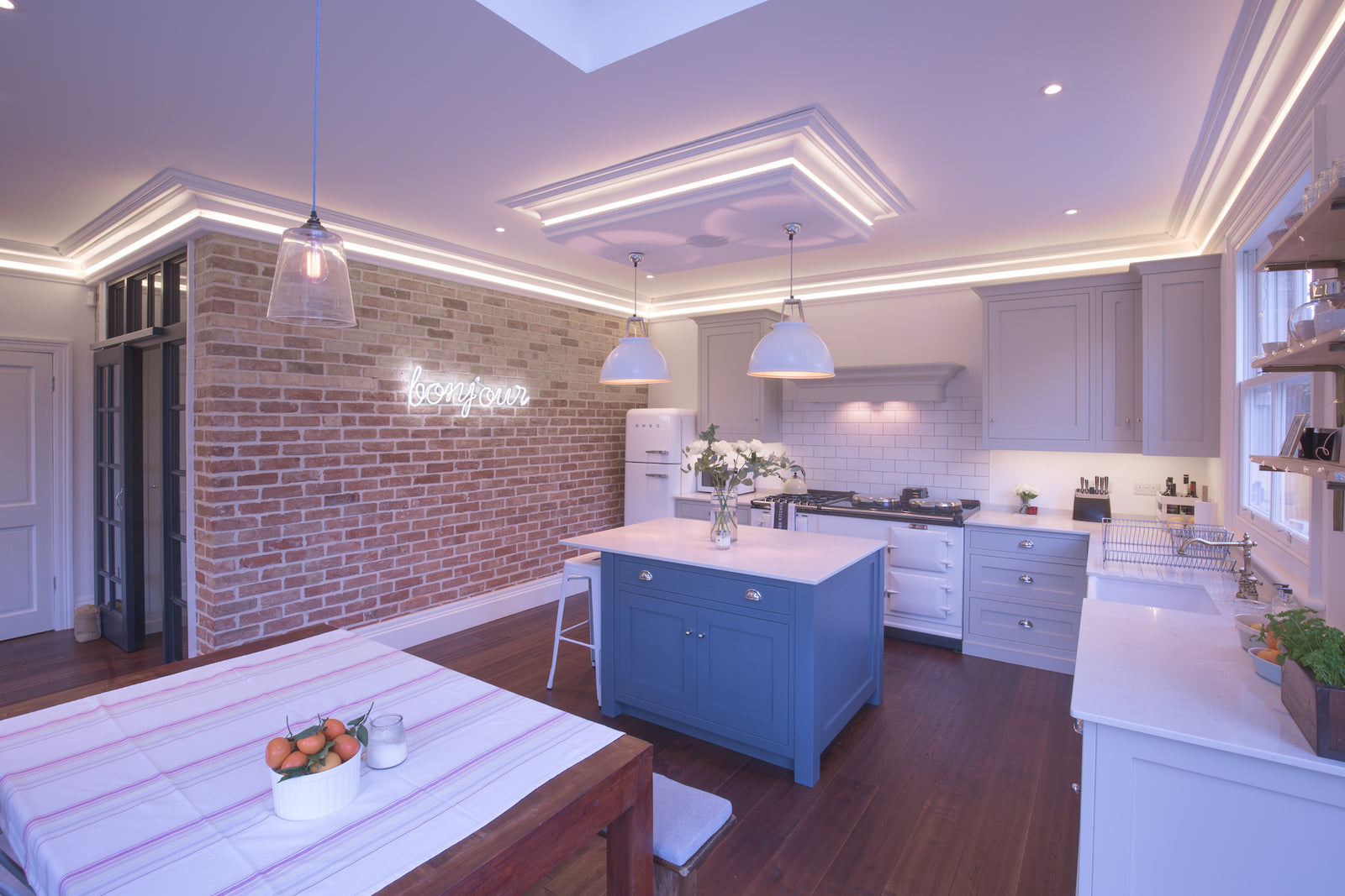 bonjour' white neon sign. Real glass neon fitted directly onto the wall.