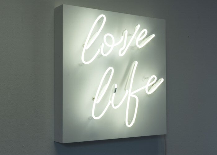 love life' white neon light. Real glass neon fitted onto front of white acrylic case.