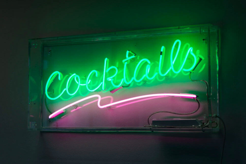 Cocktails with Underline Neon Sign